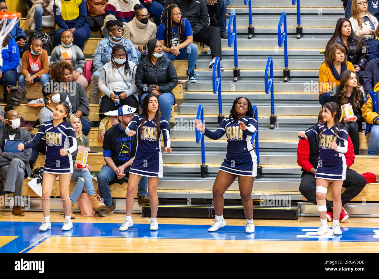 The Hammond Bishop Noll Institute cheerleaders perform during a game at North Judson, Indiana, USA. Stock Photo