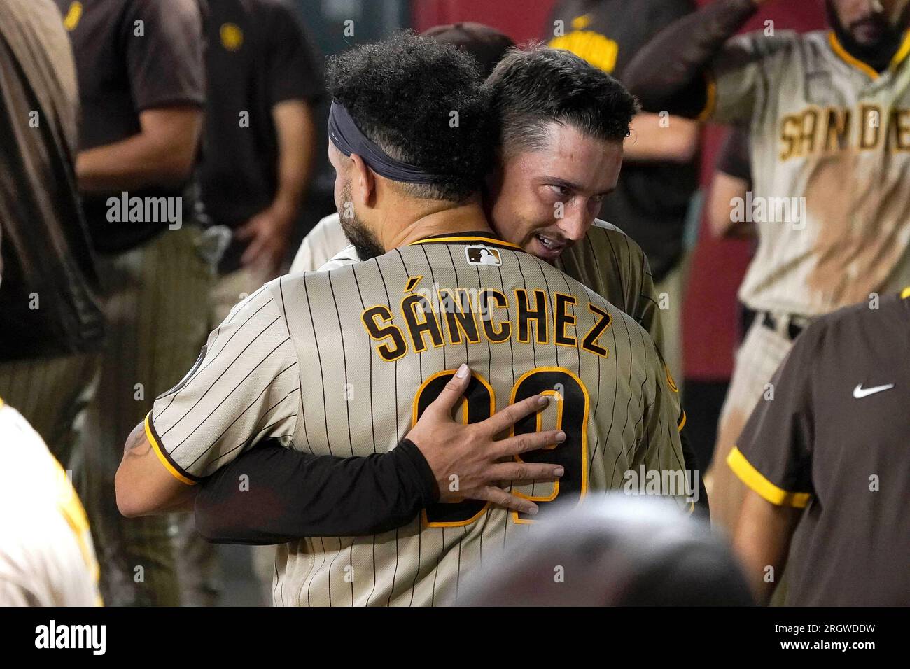 San Diego Padres catcher Gary Sanchez gets a hug from Blake Snell, who  pitches six innings against the Arizona Diamondbacks in a baseball game  Friday, Aug. 11, 2023, in Phoenix. (AP Photo/Darryl