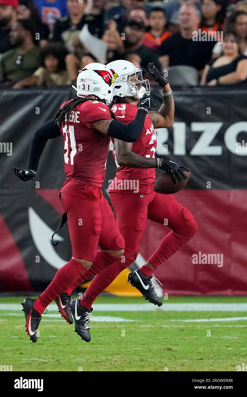 Arizona Cardinals cornerback Antonio Hamilton Sr., right, celebrates after  intercepting a pass with safety Andre Chachere during the second half of an  NFL preseason football game against the Denver Broncos in Glendale,