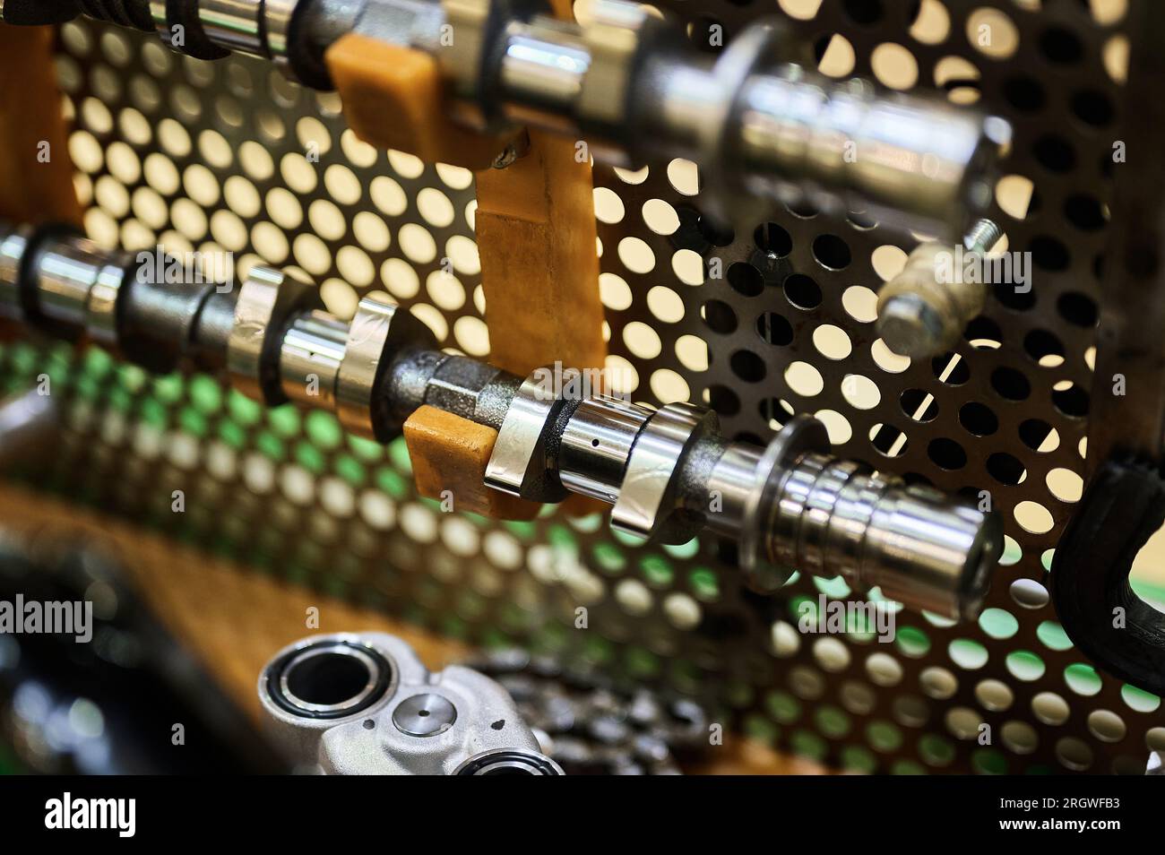 Camshaft of gas distribution mechanism of car engine closeup Stock