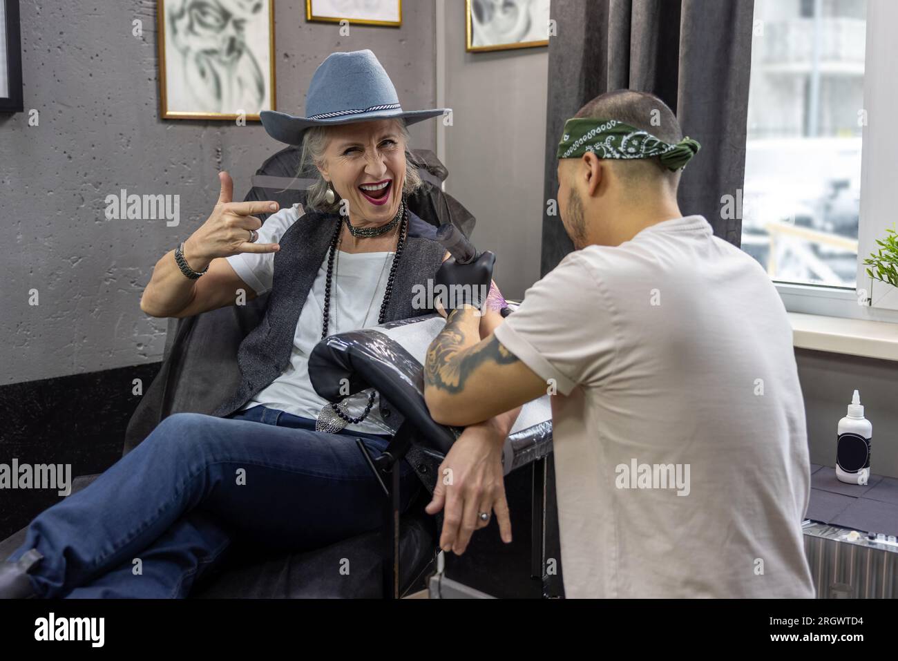 Mature woman tattoo hi-res stock photography and images - Alamy