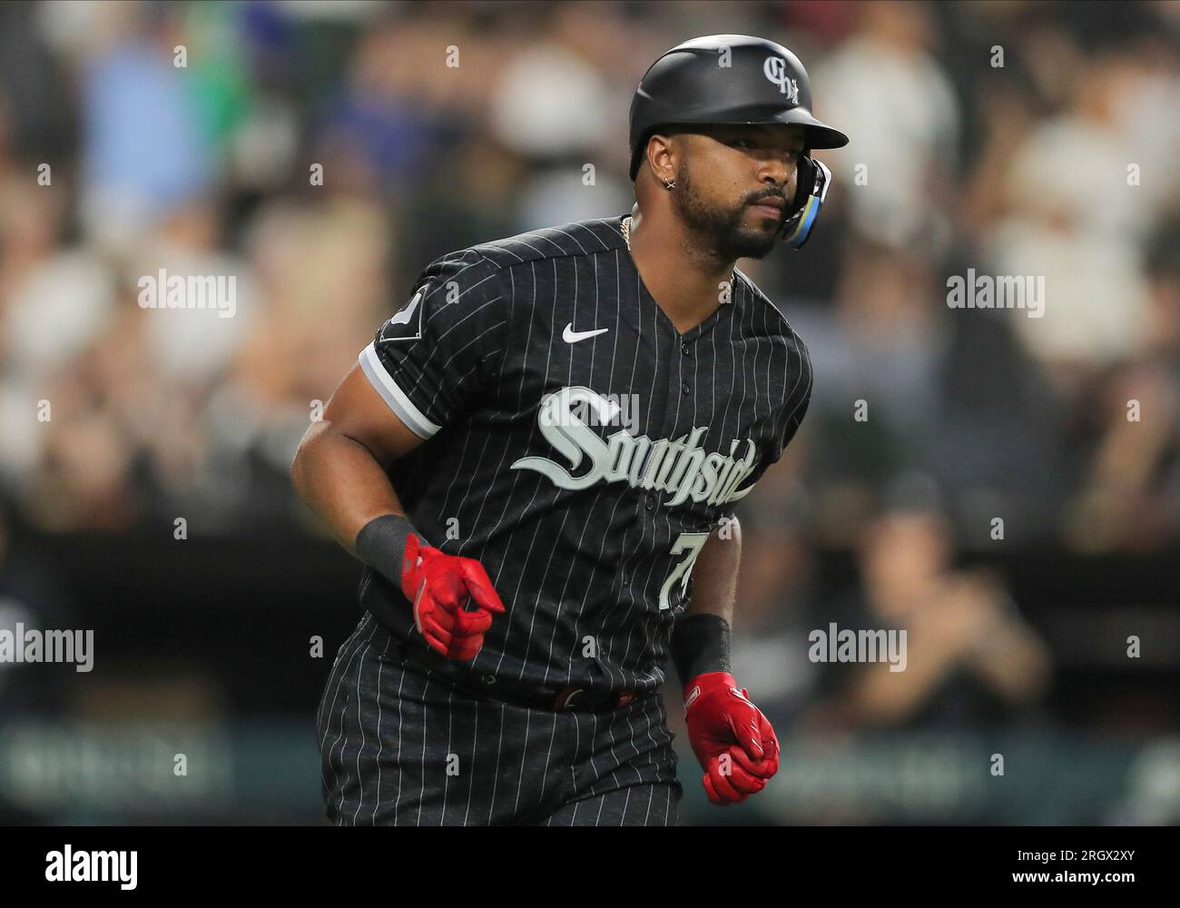 CHICAGO, IL - AUGUST 11: Chicago White Sox designated hitter Eloy Jimenez ( 74) looks on after hitting a home run during a Major League Baseball game  between the Milwaukee Brewers and the