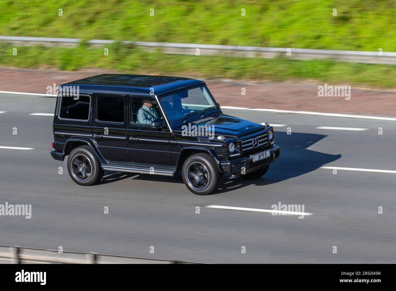 2017 Black Mercedes Benz G 350 4matic D Auto, G350d 7G-Tronic  Car SUV Diesel 2987 cc, G-Wagon, or Gelandewagen, big, boxy, retro, off-road Mercedes expensive SUV; travelling at speed on the M6 motorway in Greater Manchester, UK Stock Photo