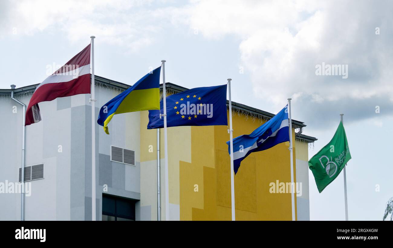 Flags of different countries flutter in the wind Stock Photo Alamy