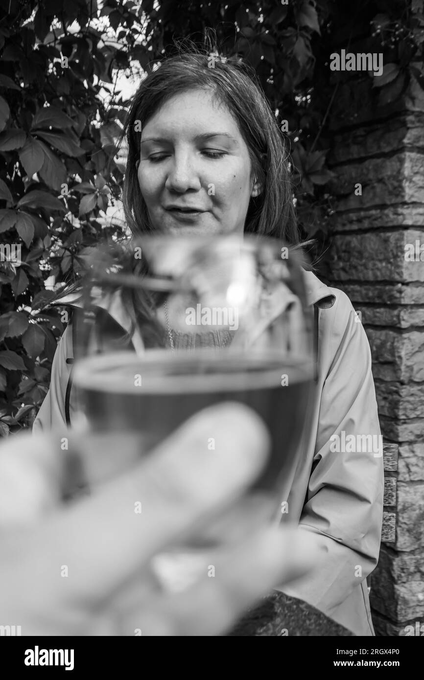 Female hand holding glass Black and White Stock Photos &amp; Images - Alamy