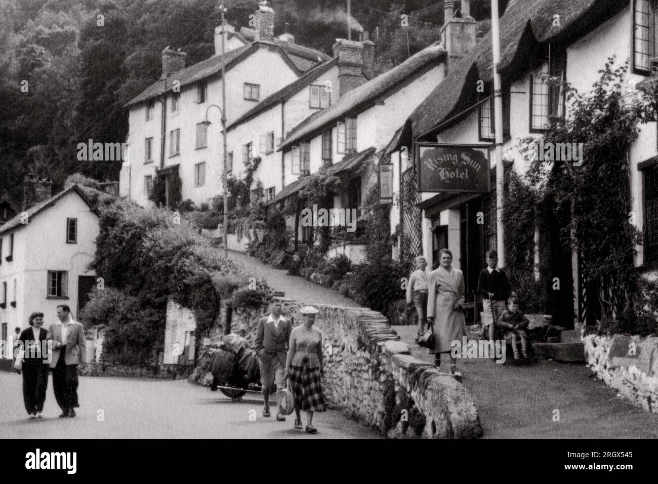 Lynmouth, Devon, England in the summer of 1952, “approximately three weeks before the Lynmouth flood disaster”, according to a hand-written note by the photographer.  The “flood disaster” occurred on the night of Friday 15 August 1952 when a wall of water and rubble hit the town and 34 people died.  Effectively, Lynmouth was destroyed and took six years to rebuild. Stock Photo