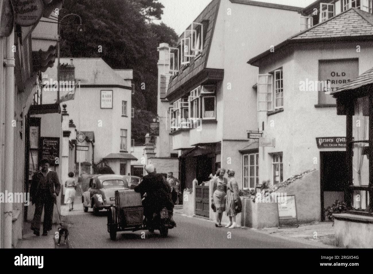 Bustling coastal tourist town of Lynmouth, Devon, England, complete with ice cream parlour, in the summer of 1952.  This photograph was taken approximately three weeks before the Lynmouth flood disaster, which occurred on the night of Friday 15 August 1952. Stock Photo