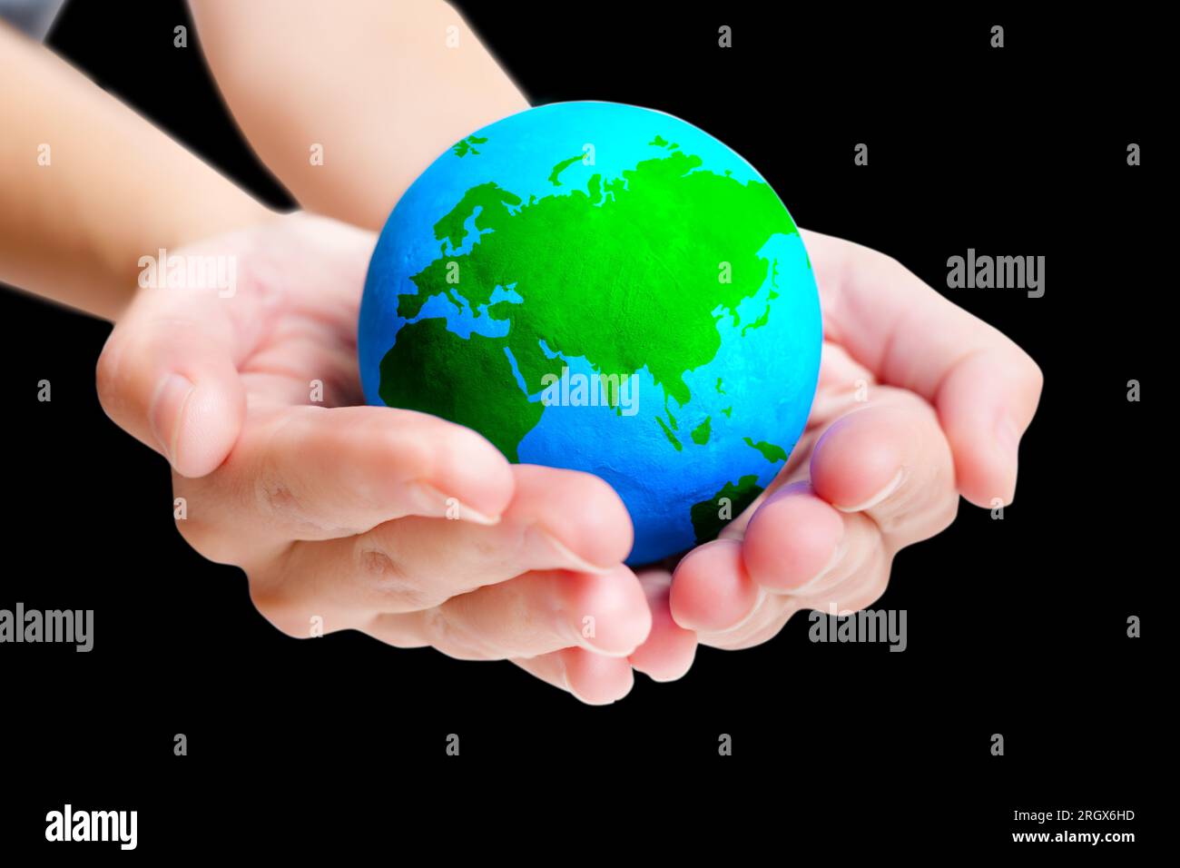 Hands holding up globe hi-res stock photography and images - Alamy