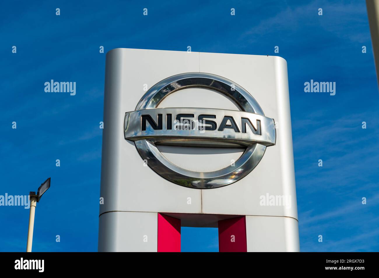 Wolverhampton, UK - August 11 2023: Nissan Motor Co Ltd logo board outside dealership in Wolverhampton, UK Stock Photo