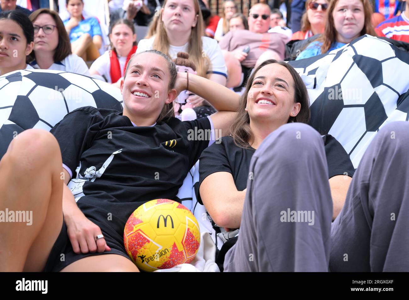 EDITORIAL USE ONLY (left to right) Footballers Maya Le Tissier and Anna Patten and attend a screening in St. Albans of the England vs. Columbia quarter final match of the FIFA Women's World Cup hosted by McDonalds, the official restaurant sponsor of the tournament. Picture date: Saturday August 12, 2023. Stock Photo