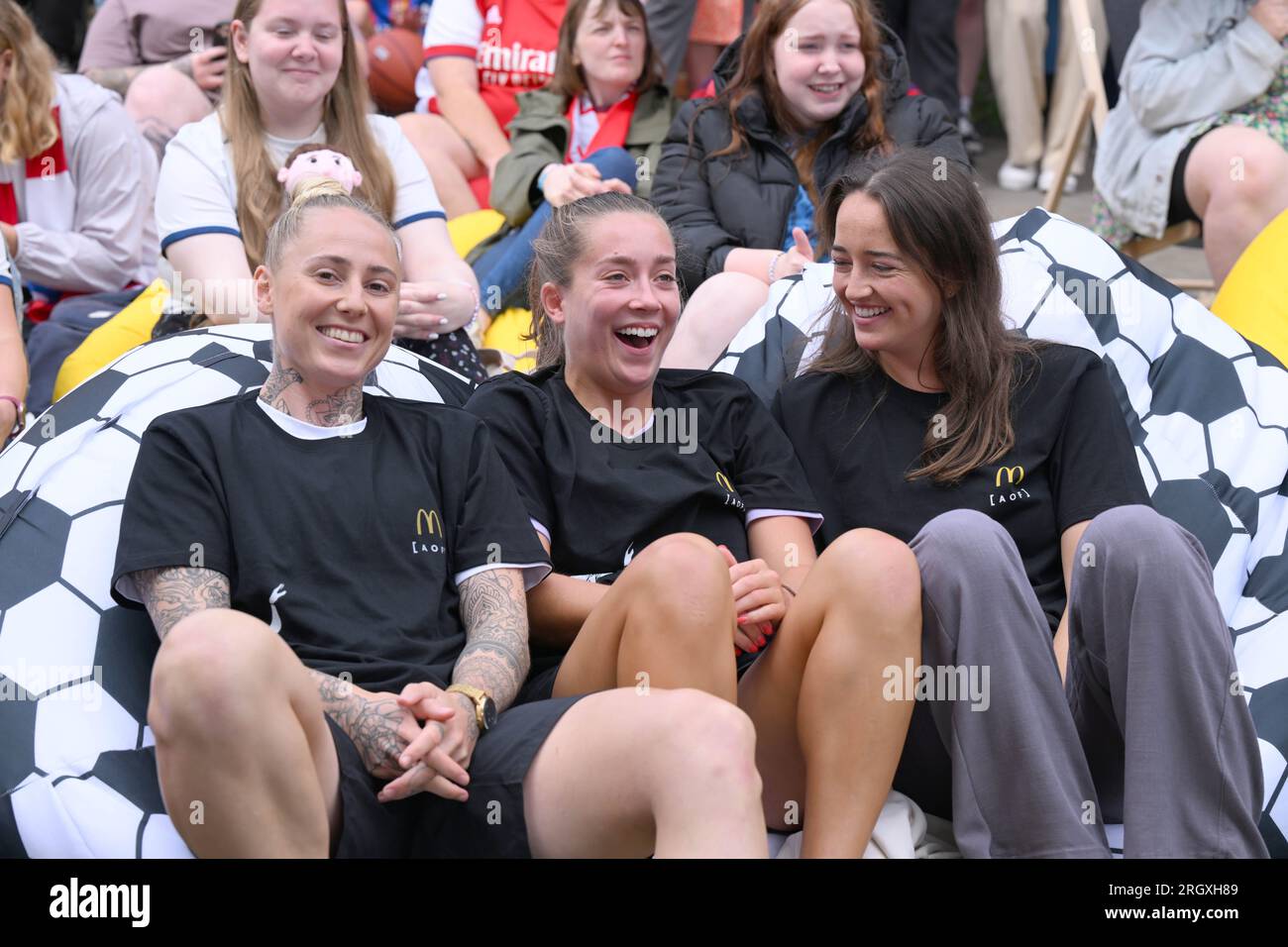 EDITORIAL USE ONLY (left to right) Footballers Leah Galton, Maya Le Tissier and Anna Patten and attend a screening in St. Albans of the England vs. Columbia quarter final match of the FIFA Women's World Cup hosted by McDonalds, the official restaurant sponsor of the tournament. Picture date: Saturday August 12, 2023. Stock Photo