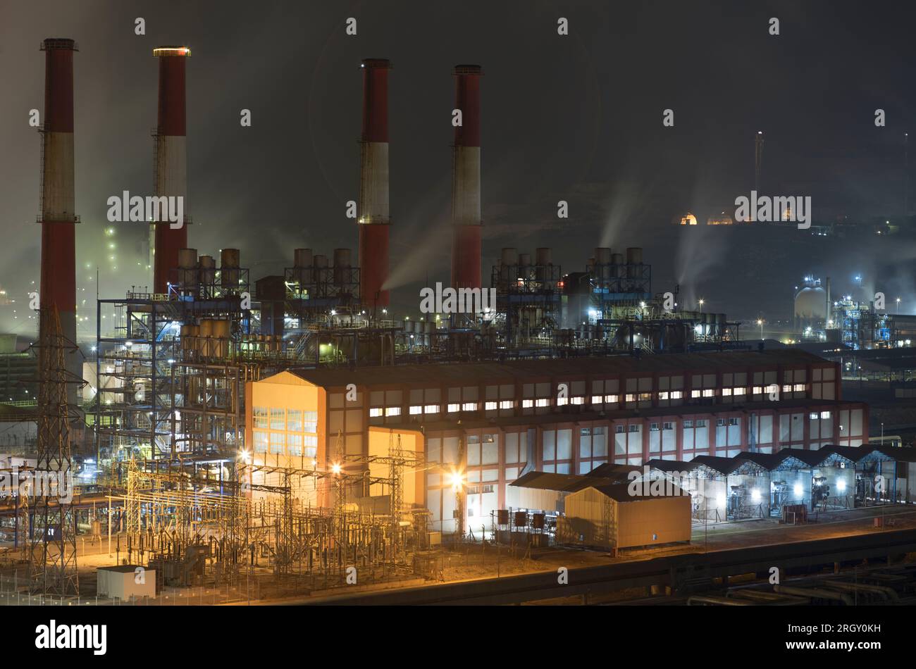 beautiful pictures of a natural gas factory at night and flashing
