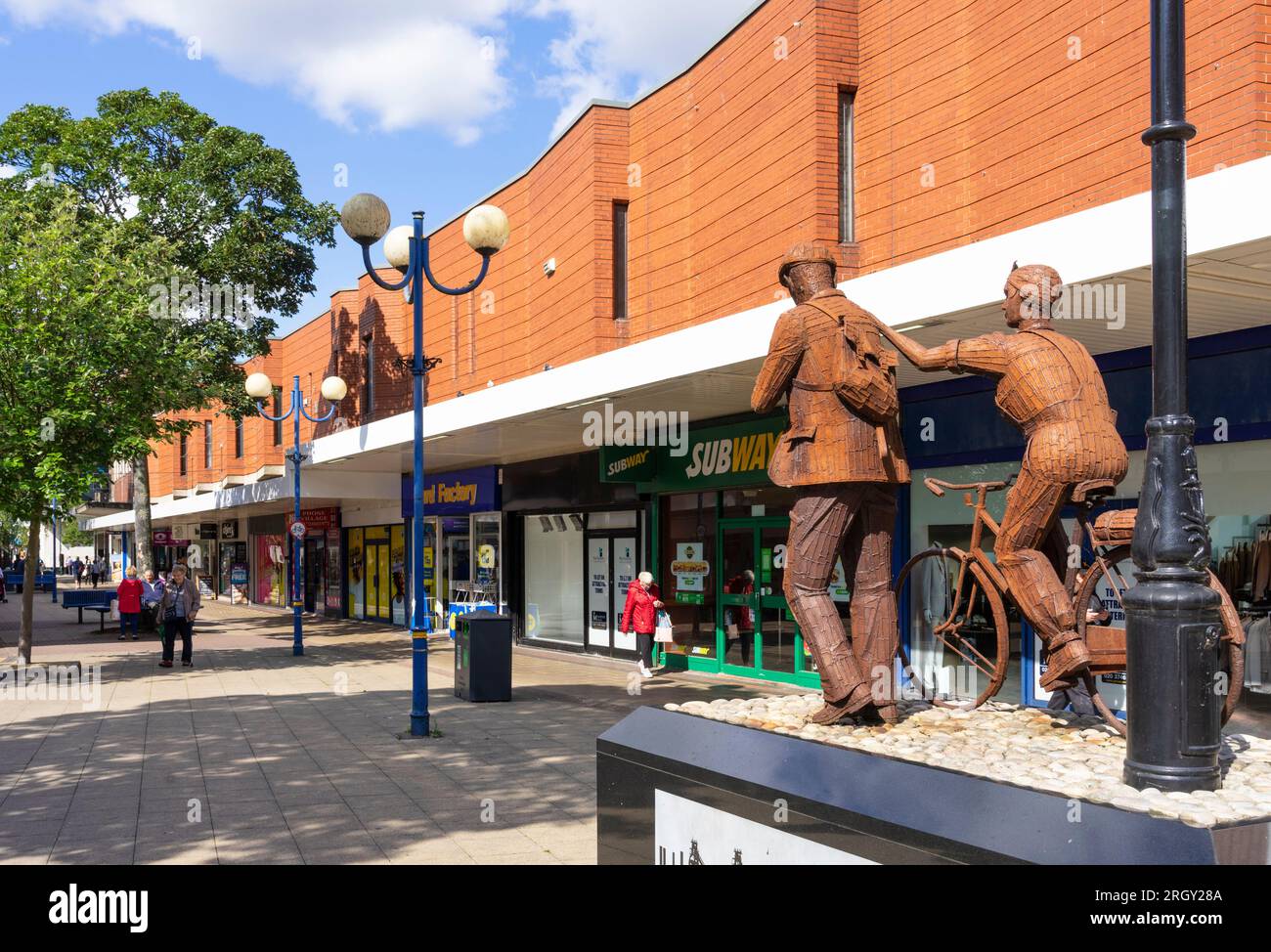 Scunthorpe Steelworkers Sculpture by artist Ray Lonsdale on Scunthorpe High street Scunthorpe North Lincolnshire England UK GB Europe Stock Photo
