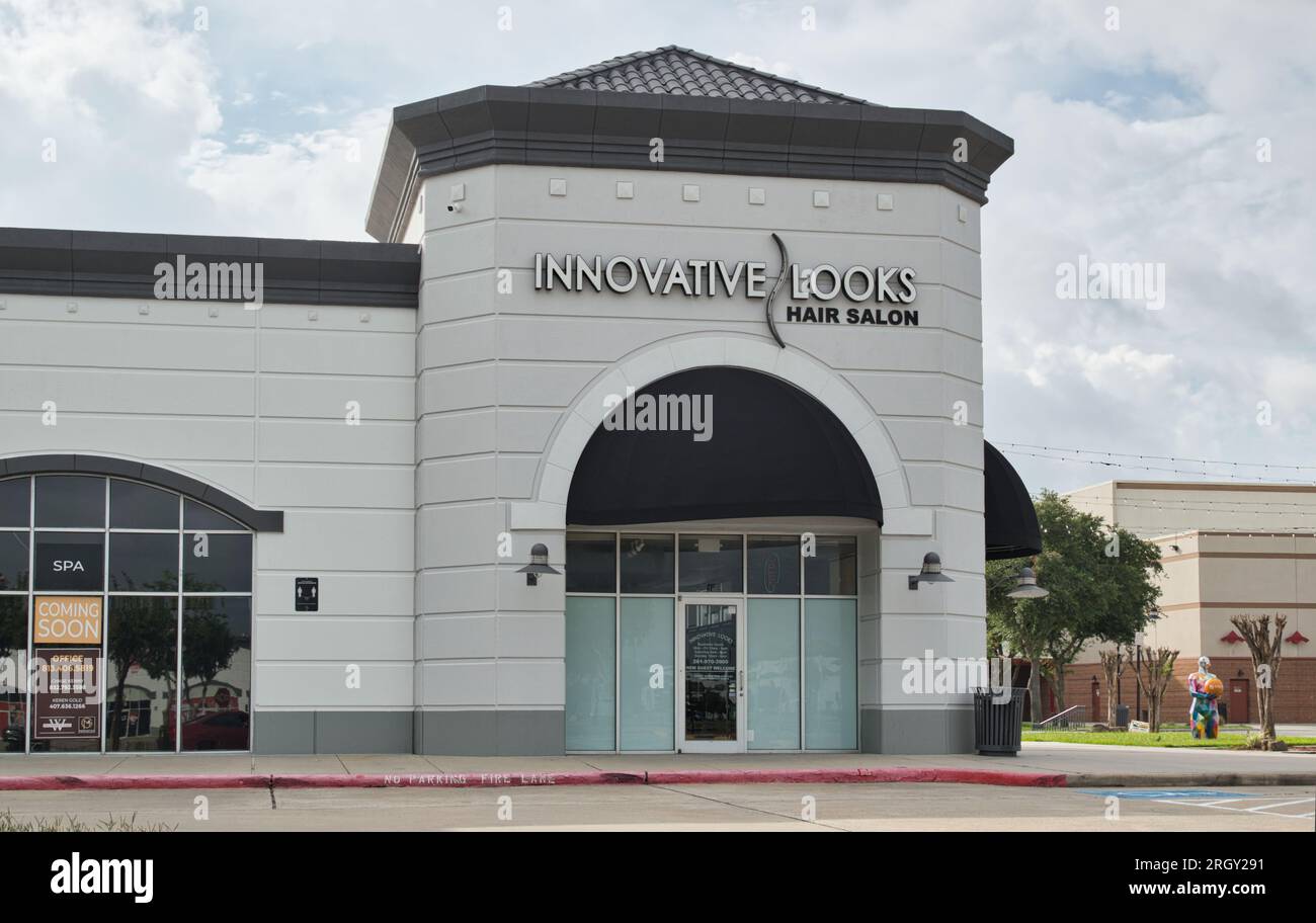 Houston, Texas USA 07-04-2023: Innovative Looks Hair Salon storefront exterior in Houston, TX. Local hairdresser business outside front view. Stock Photo