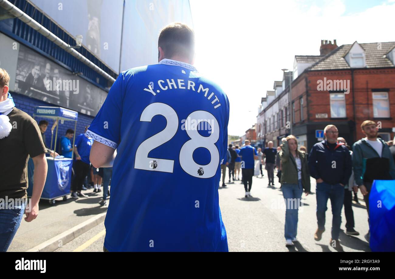 Goodison Park, Liverpool, UK. 12th Aug, 2023. Premier League Football, Everton versus Fulham; an Everton supporter in Goodison Road wears a shirt with the name of new signing Youssef Chermiti Credit: Action Plus Sports/Alamy Live News Stock Photo