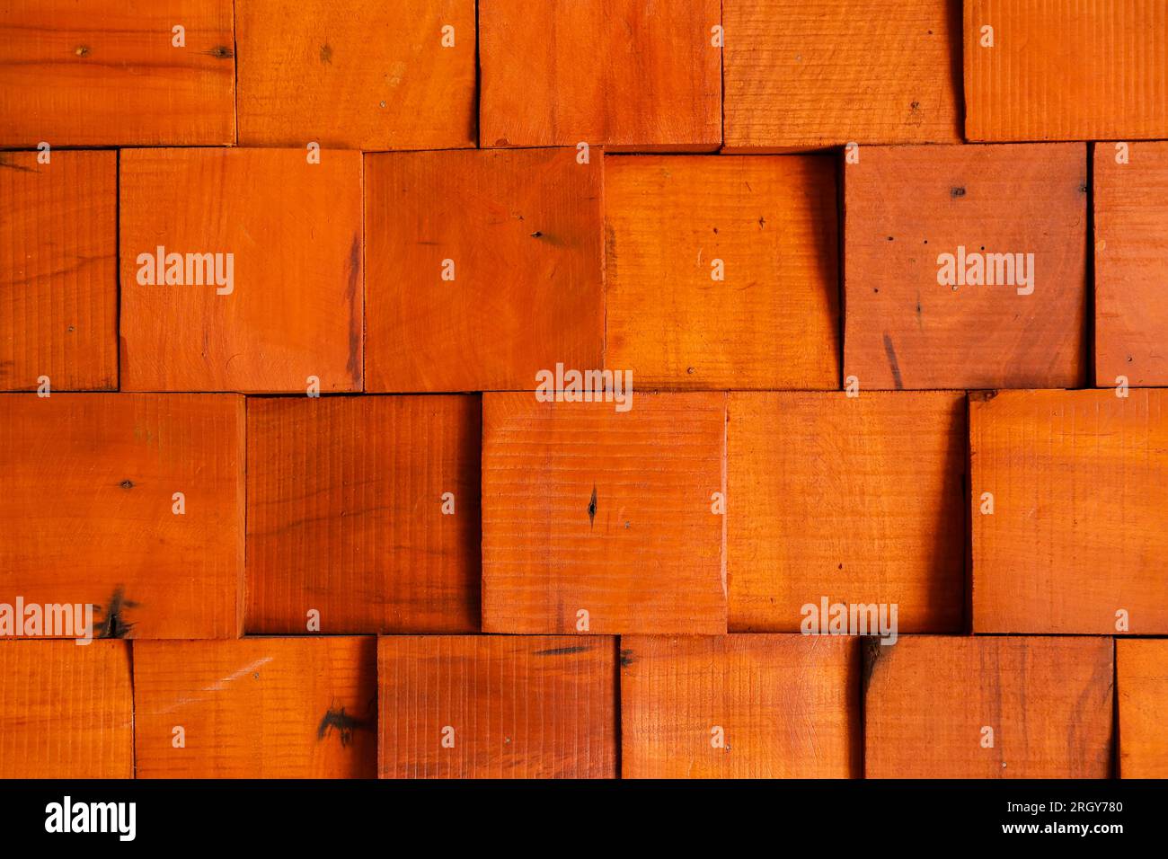 wall texture with wooden bricks, abstract scene background in warm tone and light and shadow effect Stock Photo