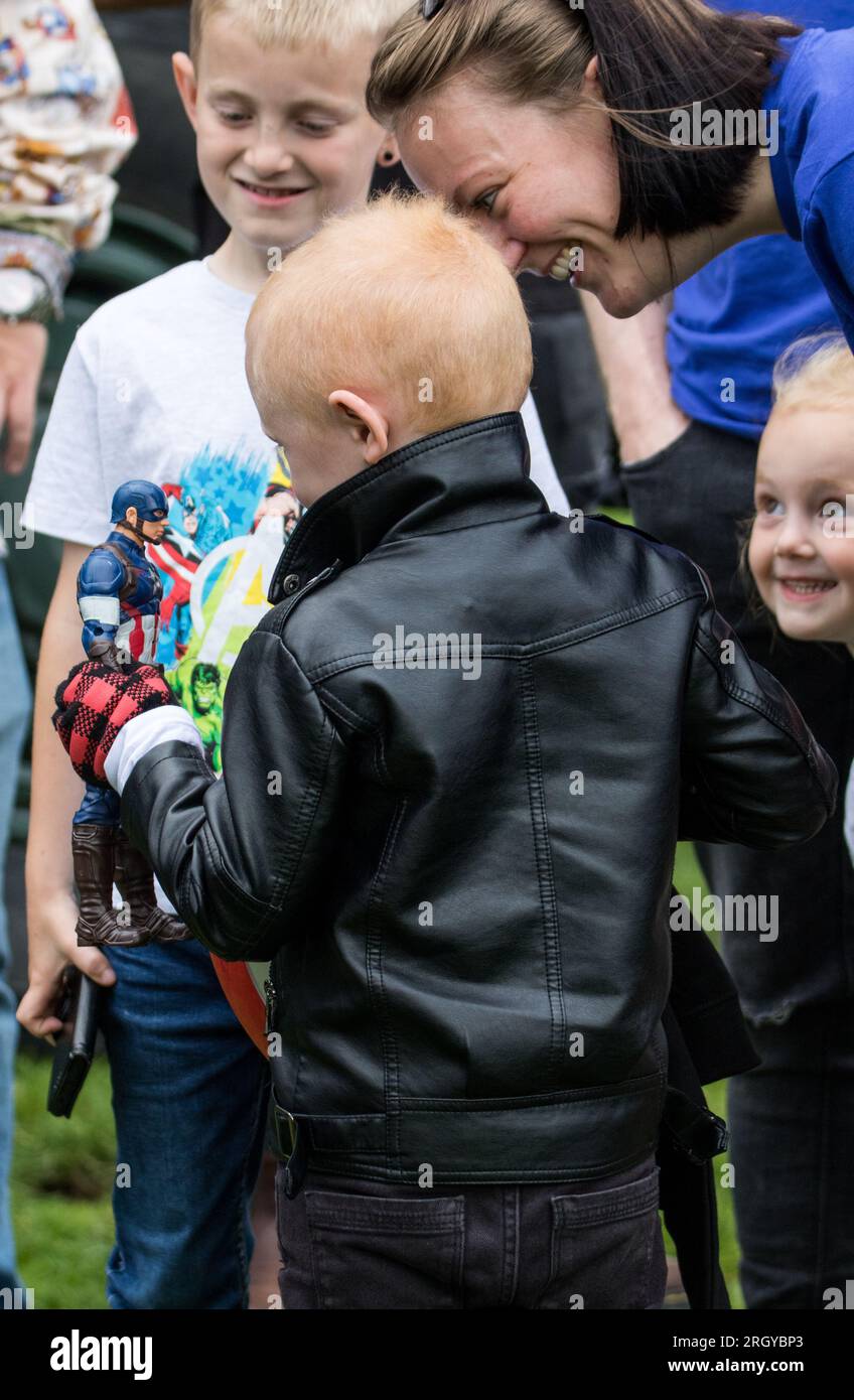Eastbourne, East Sussex, UK. 12th Aug, 2023. Hundreds of Motorcyclists, motorcycle groups and vintage vehicles from around the region gather to take part in a fundraiser for 6 year Alfie from Eastbourne who has been battling a brain tumour since 2017. The riders who will escort Alfie around the parts of East Sussex to raise funds to assist with Alfie's treatment for the tumour which is now impacting on his eyesight. Any funds raised will also go towards financing a trip to Disneyland for Alfie and his family. Credit: Newspics UK South/Alamy Live News Stock Photo