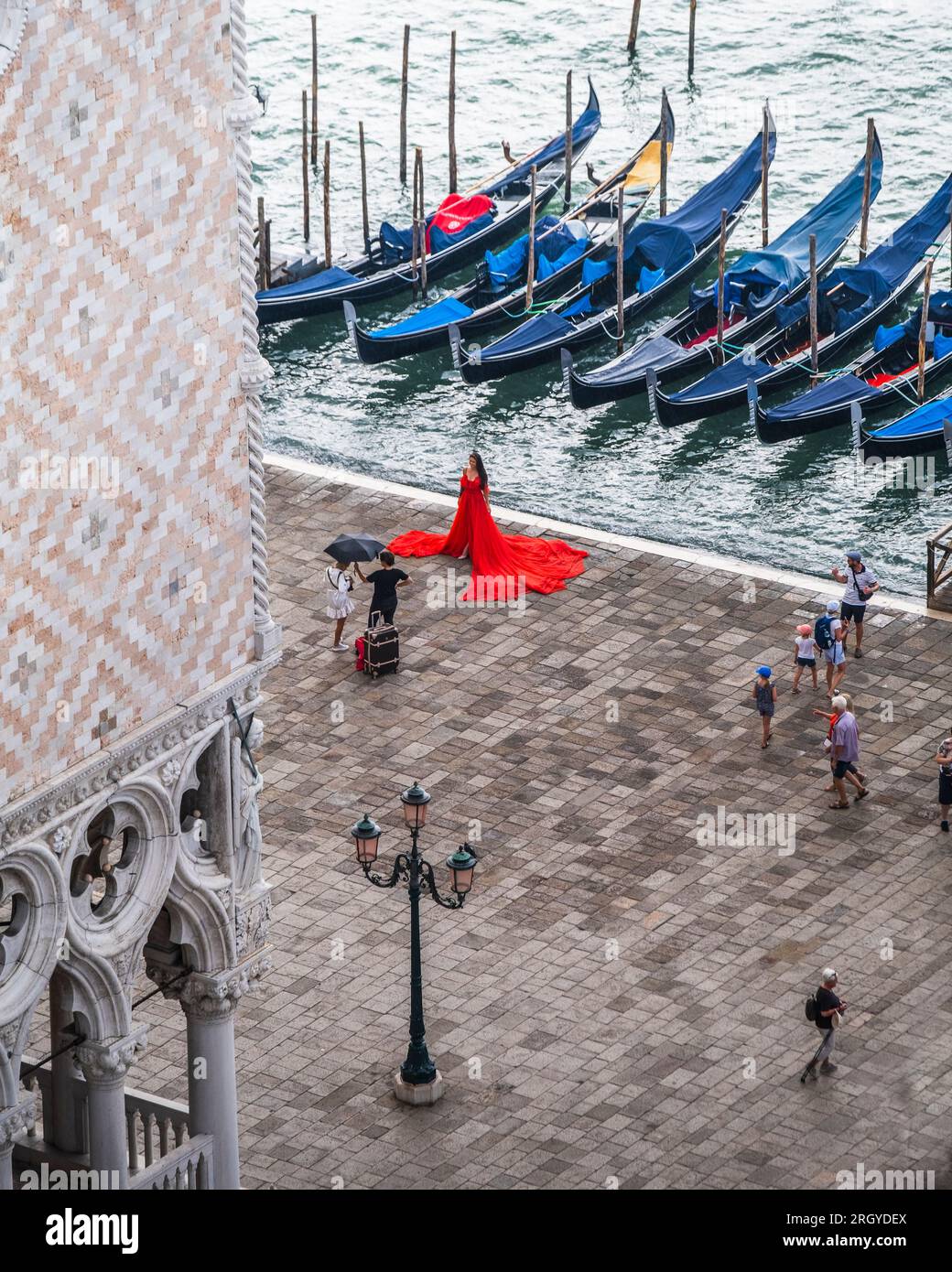 Love blossoms in Venice's enchanting outdoor pre-wedding shoot. Stock Photo