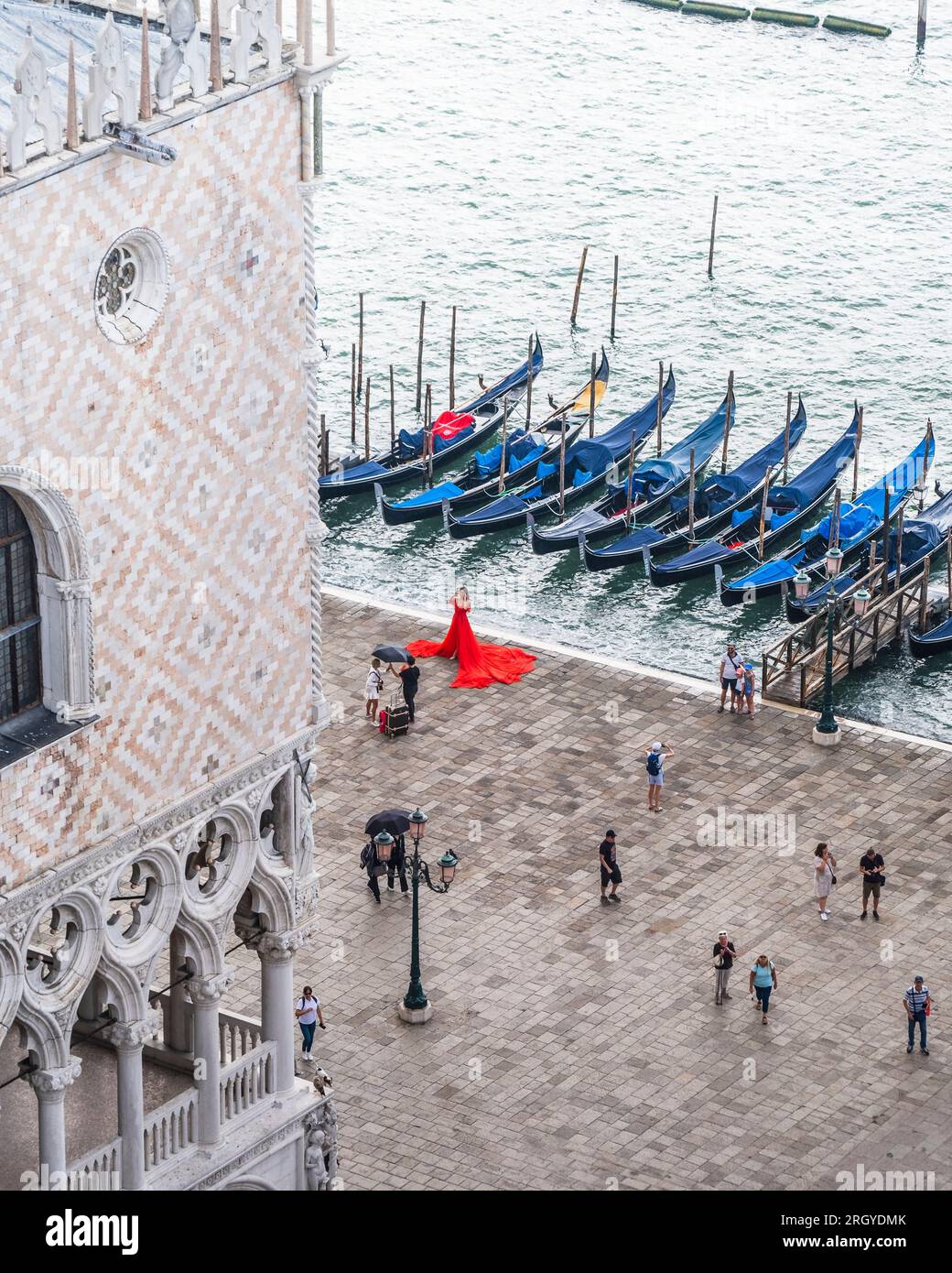 Love blossoms in Venice's enchanting outdoor pre-wedding shoot. Stock Photo