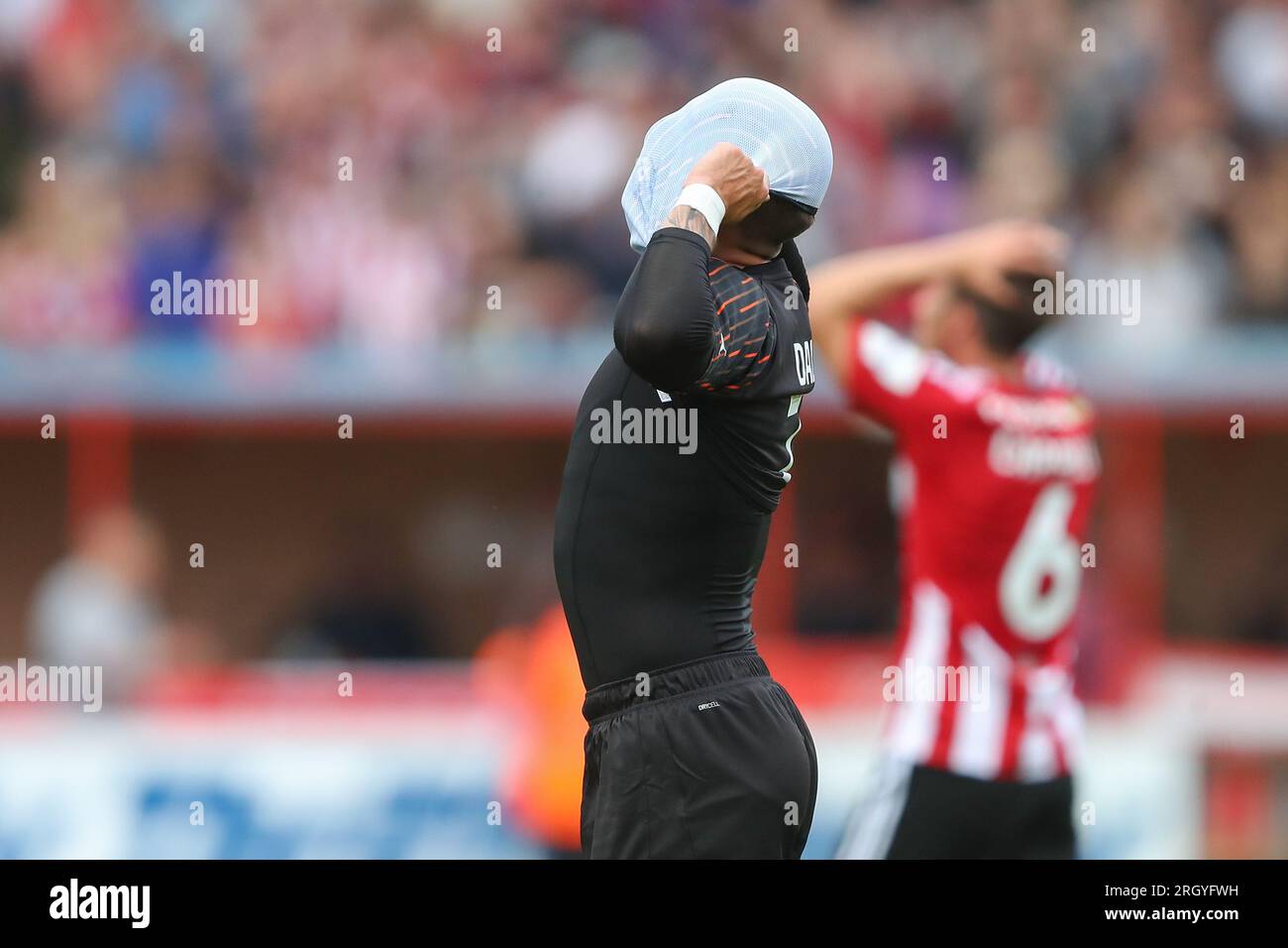 Owen Dale #7 of Blackpool reacts to his teams result after the Sky Bet League 1 match Exeter City vs Blackpool at St James' Park, Exeter, United Kingdom, 12th August 2023  (Photo by Gareth Evans/News Images) Stock Photo