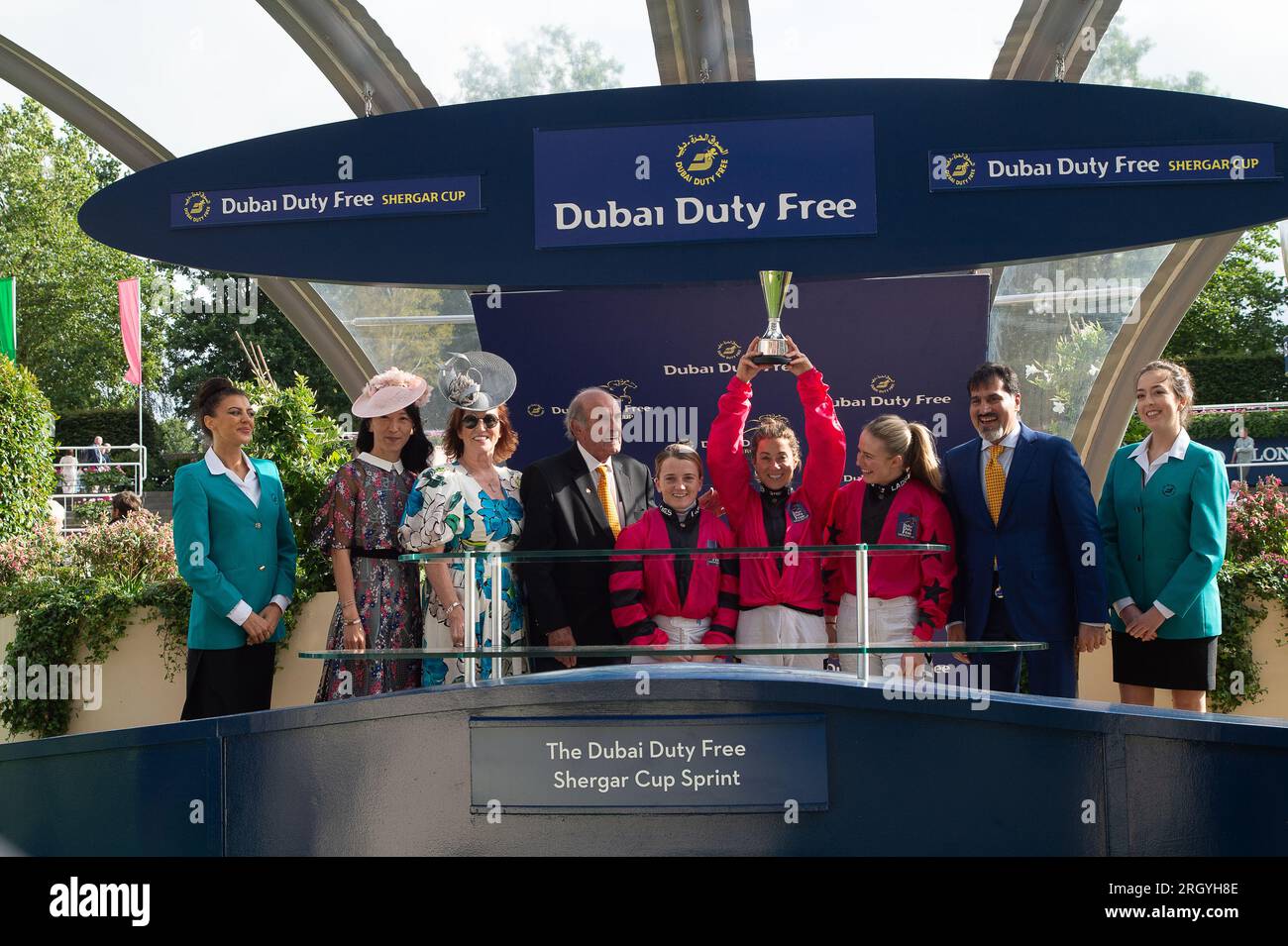 Ascot, Berkshire, UK. 12th August, 2023. The Ladies Team of Hayley Turner (Captain), Hollie Doyle and Saffie Osborne won the overall team at the Dubai Duty Free Shergar Cup at Ascot Racecourse today. They celebrated with spraying champagne over each other. Credit: Maureen McLean/Alamy Live News Stock Photo