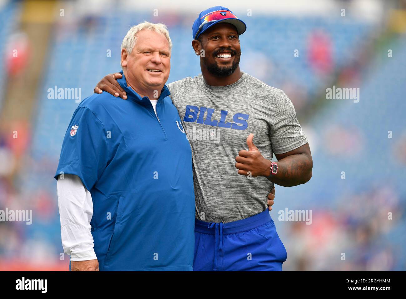 Indianapolis Colts linebackers coach Richard Smith, left, poses for