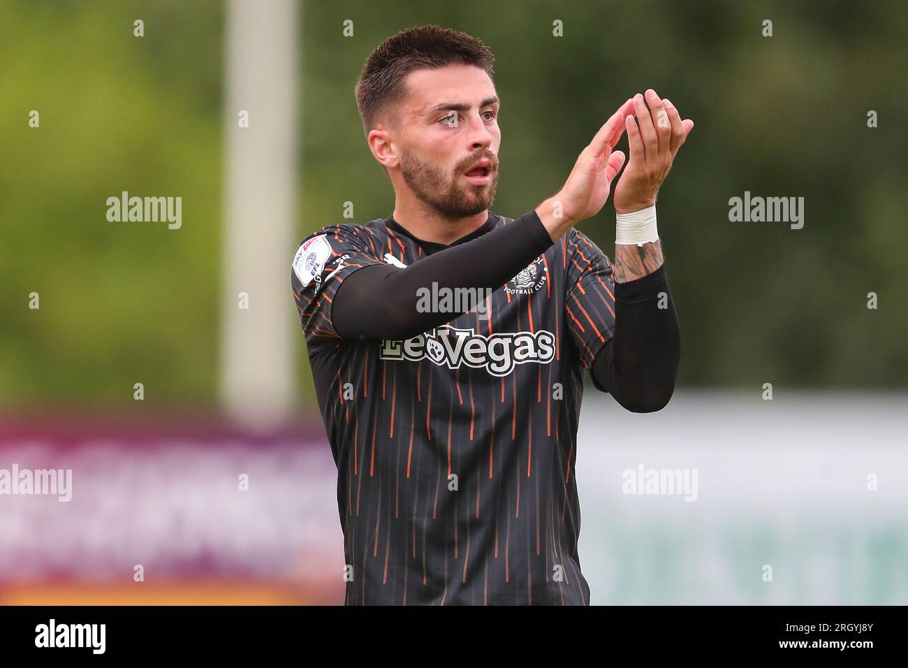 Owen Dale #7 of Blackpool applauds the travelling fans after the Sky Bet League 1 match Exeter City vs Blackpool at St James' Park, Exeter, United Kingdom, 12th August 2023  (Photo by Gareth Evans/News Images) Stock Photo