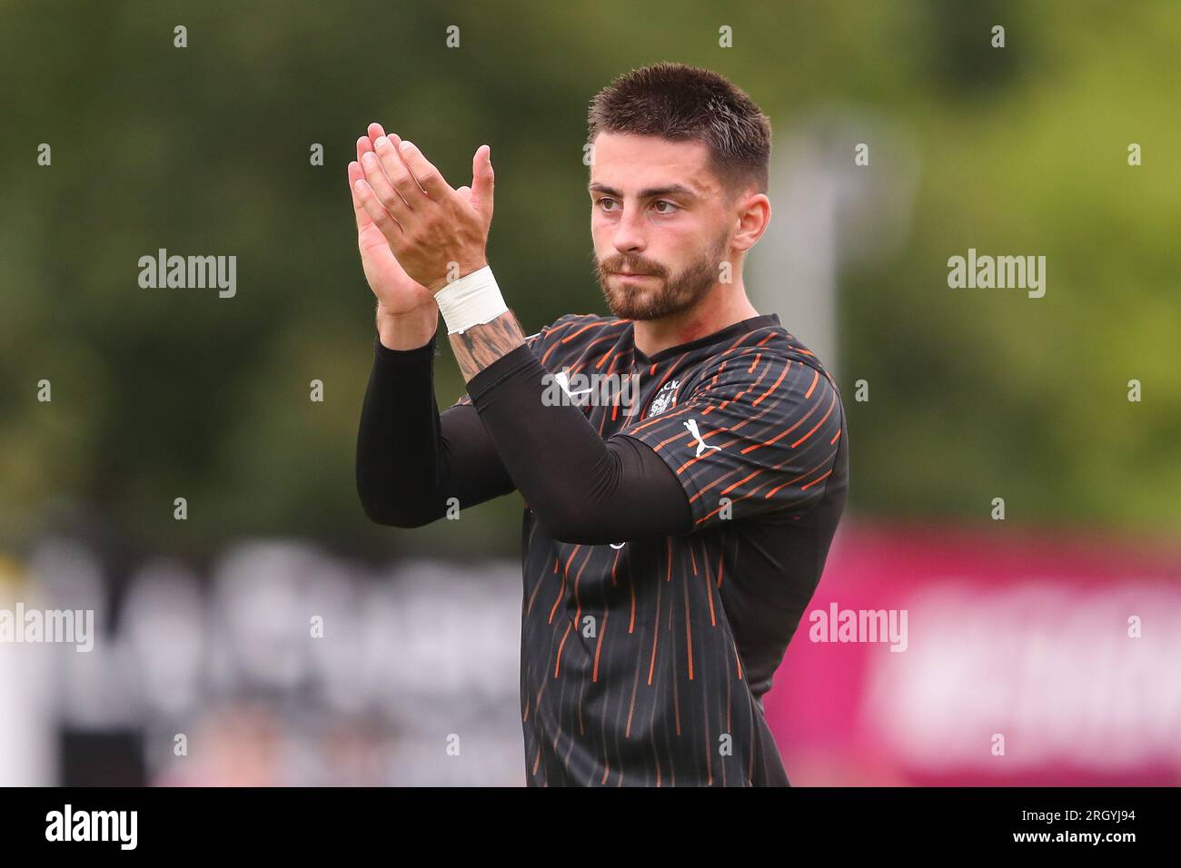 Owen Dale #7 of Blackpool applauds the travelling fans after the Sky Bet League 1 match Exeter City vs Blackpool at St James' Park, Exeter, United Kingdom, 12th August 2023  (Photo by Gareth Evans/News Images) Stock Photo