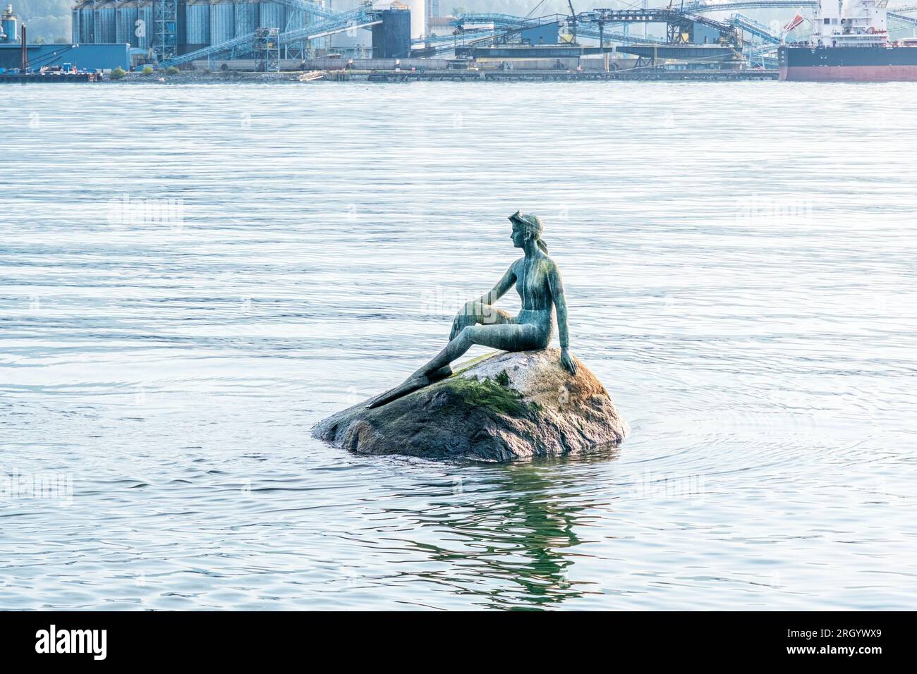 Donated to the City of Vancouver in 1972 by the Vancouver Harbour Improvement Society, Girl in Wetsuit by Elek Imredy has become one of many iconic st Stock Photo