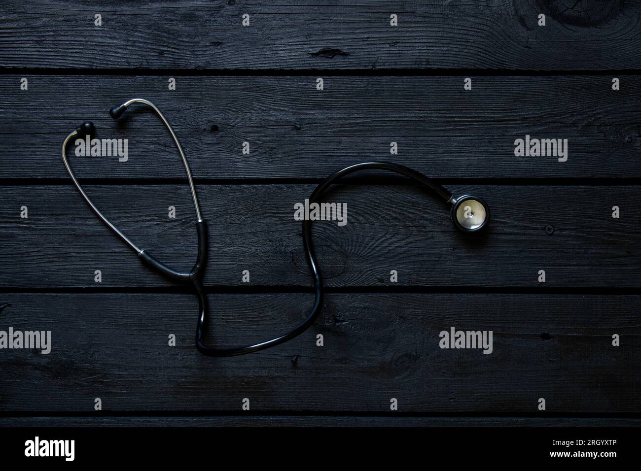 Black doctor stethoscope lies hi-res stock photography and images - Alamy