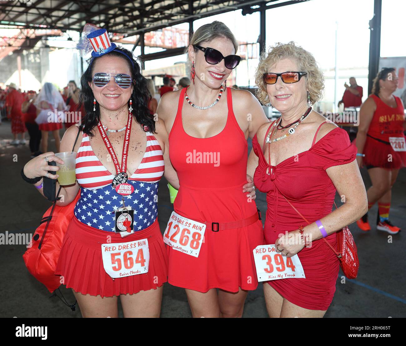 New Orleans, USA. 12th Aug, 2023. Participants of the Red Dress Run make  their way down Rampart Street in New Orleans, Louisiana on Saturday, August  12, 2023. (Photo by Peter G. Forest/Sipa