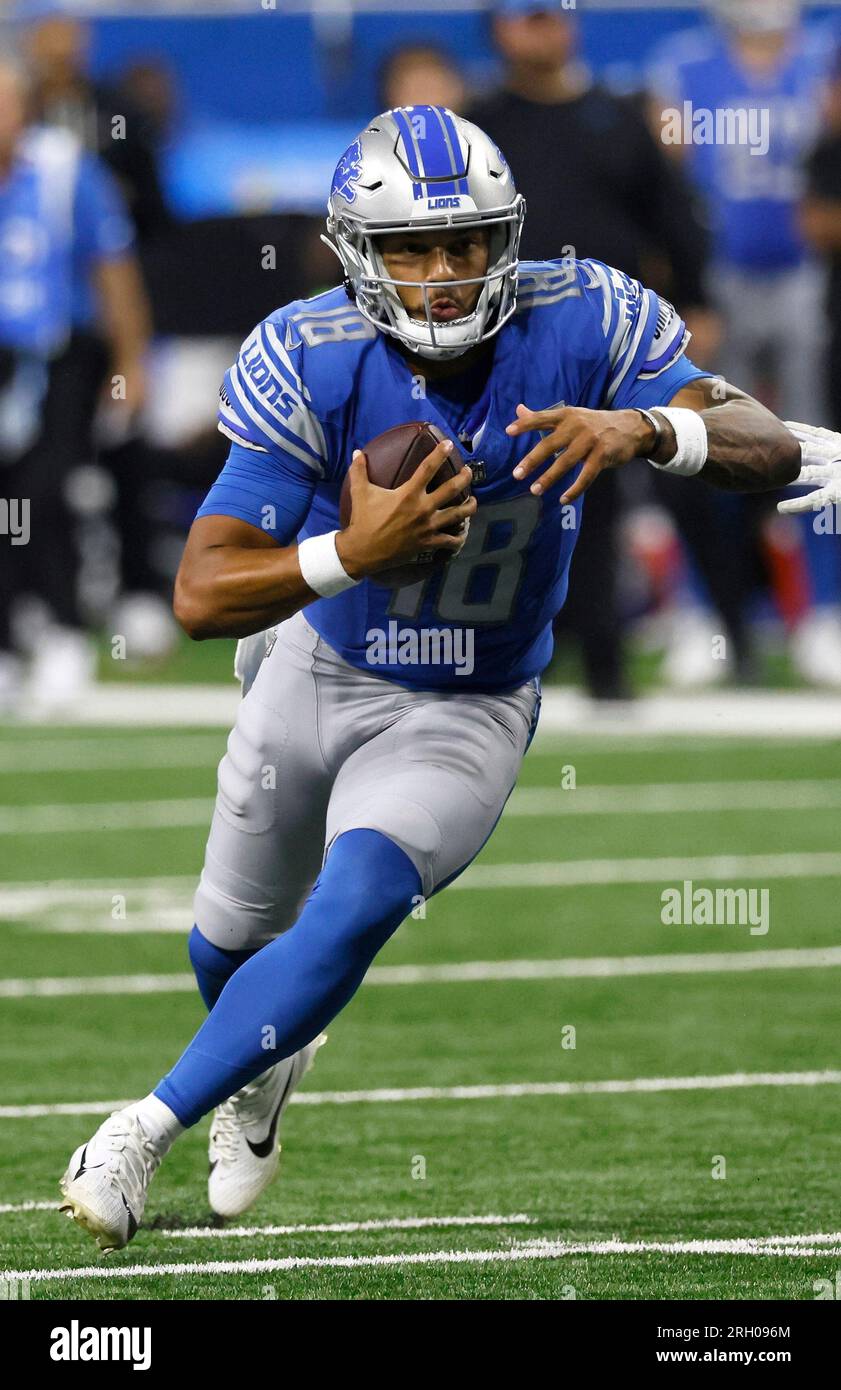 Detroit Lions quarterback Adrian Martinez (18) keeps the ball