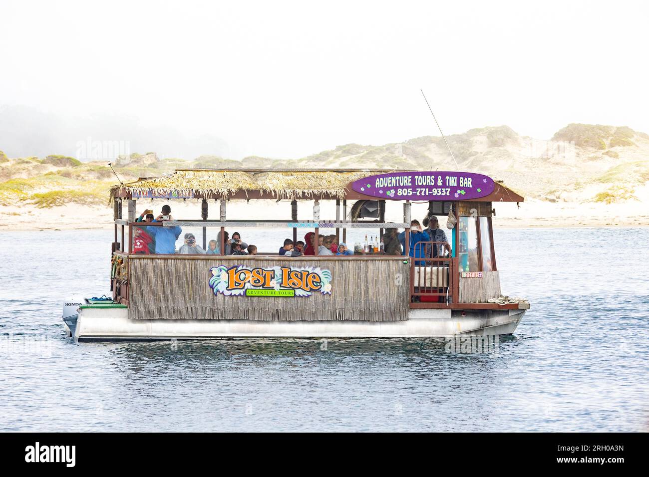 Funky Boat with Tourists Stock Photo