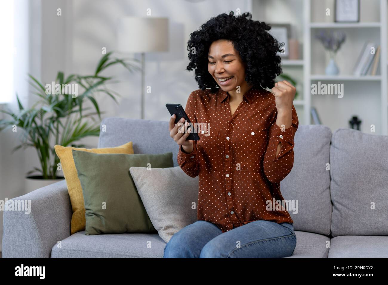 Euphoric black female employee hi-res stock photography and images - Alamy
