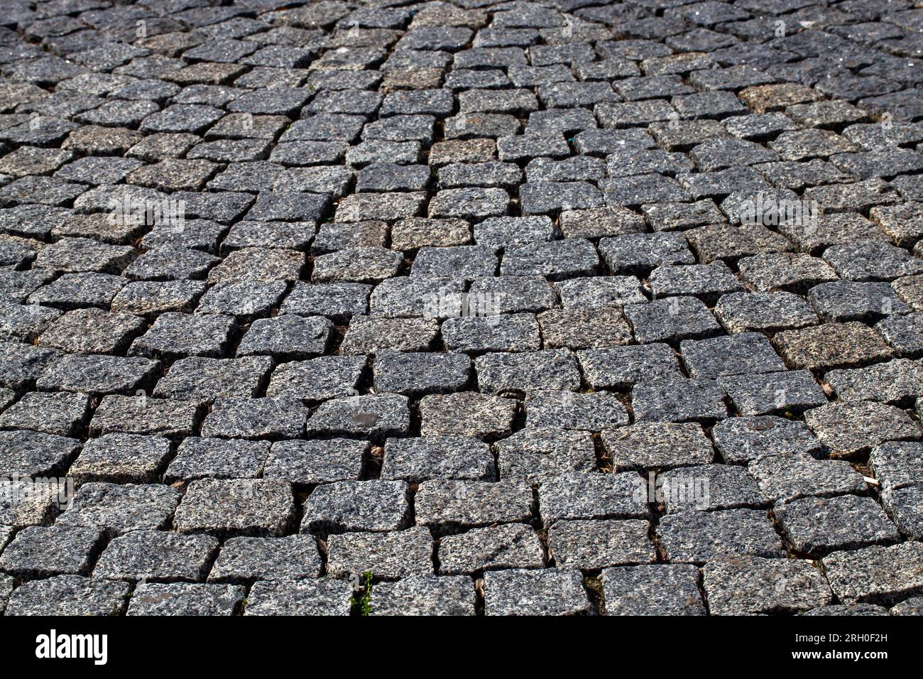 part of the highway made of concrete slabs and tiles, part of the road for cars made of tiles Stock Photo