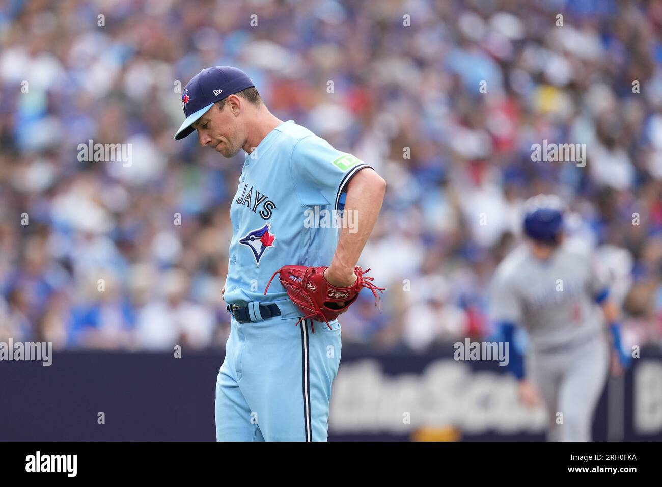Toronto, Canada. 12th Aug, 2023. Toronto Blue Jays starting pitcher Chris  Bassitt (40) reacts after giving up a three-run home run to Chicago Cubs  shortstop Dansby Swanson, not shown, during fourth inning