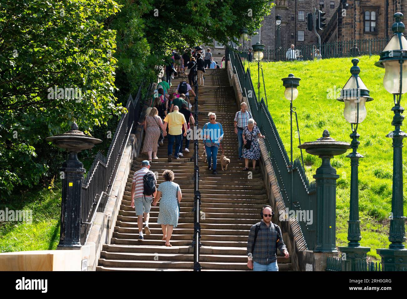 People climbing the refurbished Playfair Steps on The mound in Edinburgh, Scotland, UK Stock Photo