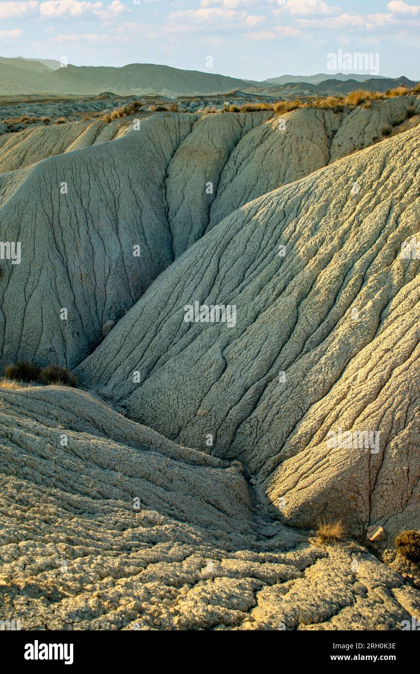 Vertical photograph of the winding arid and desert landscape of ...