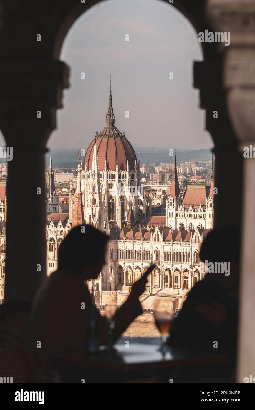 People enjoying the fantastic view of Budapest while drinking a glass of wine Stock Photo