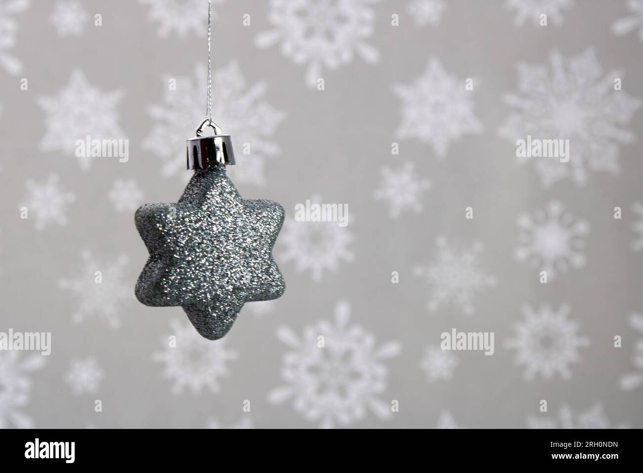 Silver glitter star, christmas ornament Stock Photo