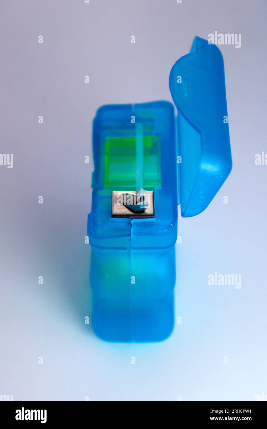 Blue case with dental floss Stock Photo Alamy