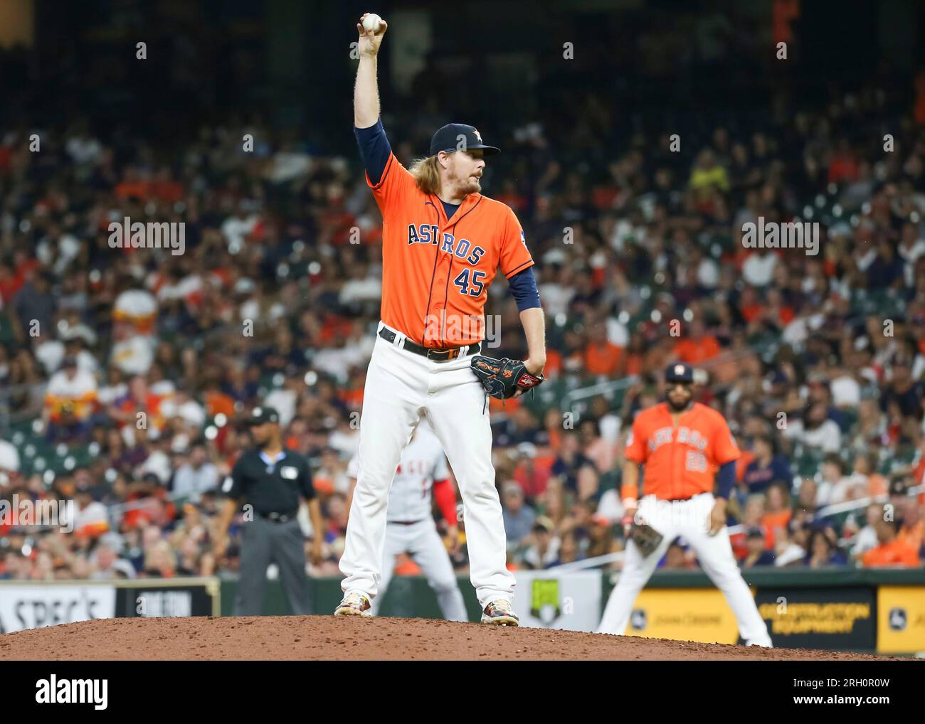 HOUSTON, TX - AUGUST 11: Houston Astros relief pitcher Ryne Stanek (45)  takes over the mood in the top of the ninth inning during the MLB game  between the Los Angeles Angels
