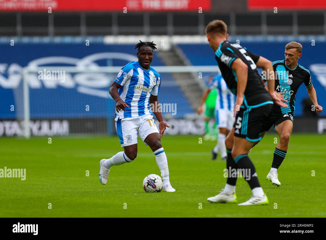 John Smith's Stadium, Huddersfield, England - 12th August 2023 Brahima Diarra (11) of Huddersfield Town looks to take on the Leicester City defence - during the game Huddersfield Town v Leicester City, Sky Bet Championship,  2023/24, John Smith's Stadium, Huddersfield, England - 12th August 2023 Credit: Mathew Marsden/WhiteRosePhotos/Alamy Live News Stock Photo