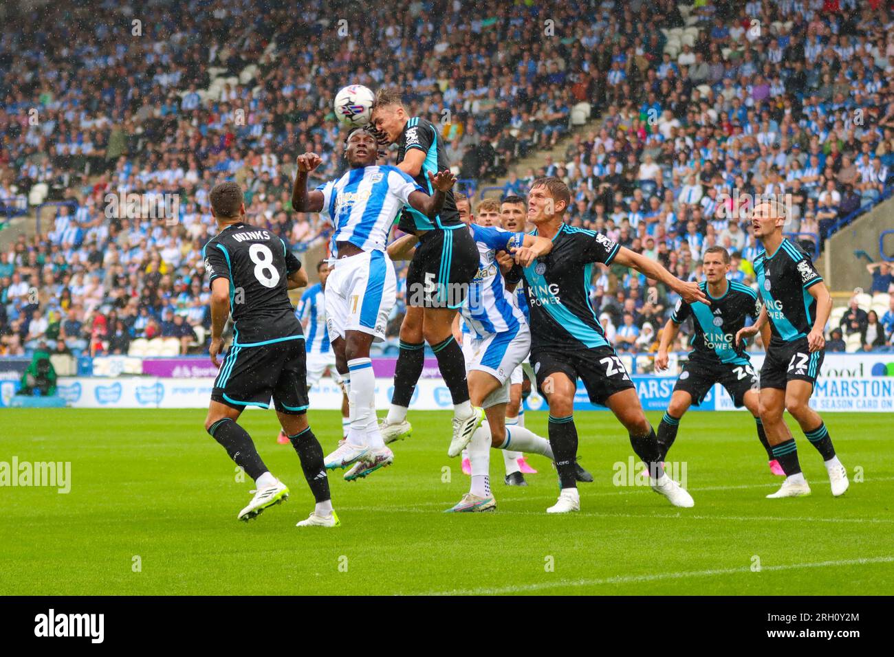 John Smith's Stadium, Huddersfield, England - 12th August 2023 Callum Doyle (5) of Leicester City heads the ball clear - during the game Huddersfield Town v Leicester City, Sky Bet Championship,  2023/24, John Smith's Stadium, Huddersfield, England - 12th August 2023 Credit: Mathew Marsden/WhiteRosePhotos/Alamy Live News Stock Photo