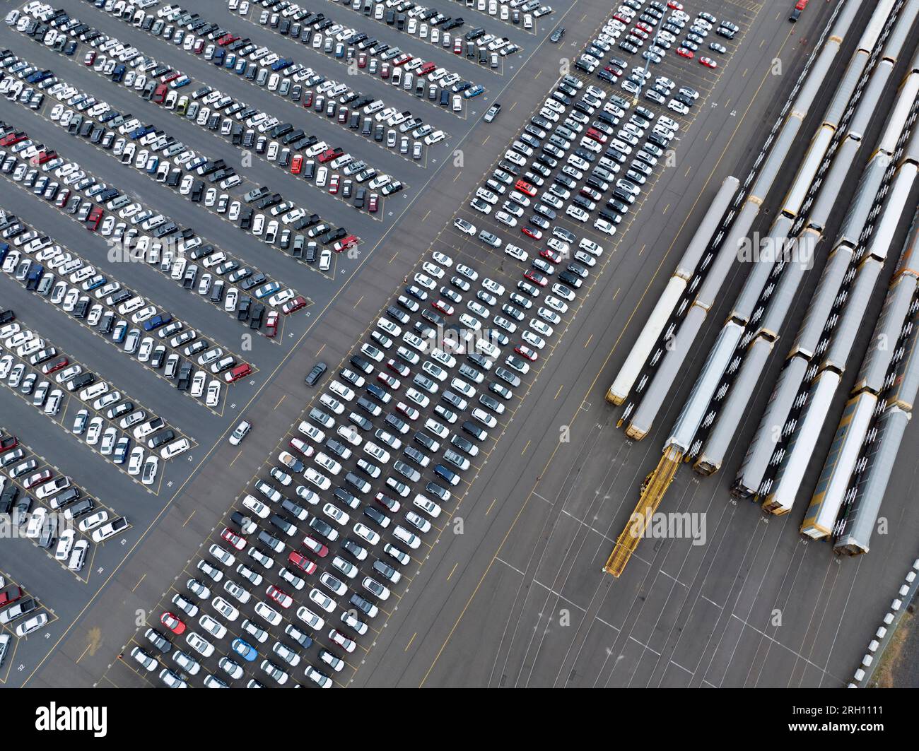 Imported auto storage and transfer yard where cars arrive by ship and are distributed by rail and truck to points in the U.S. Stock Photo