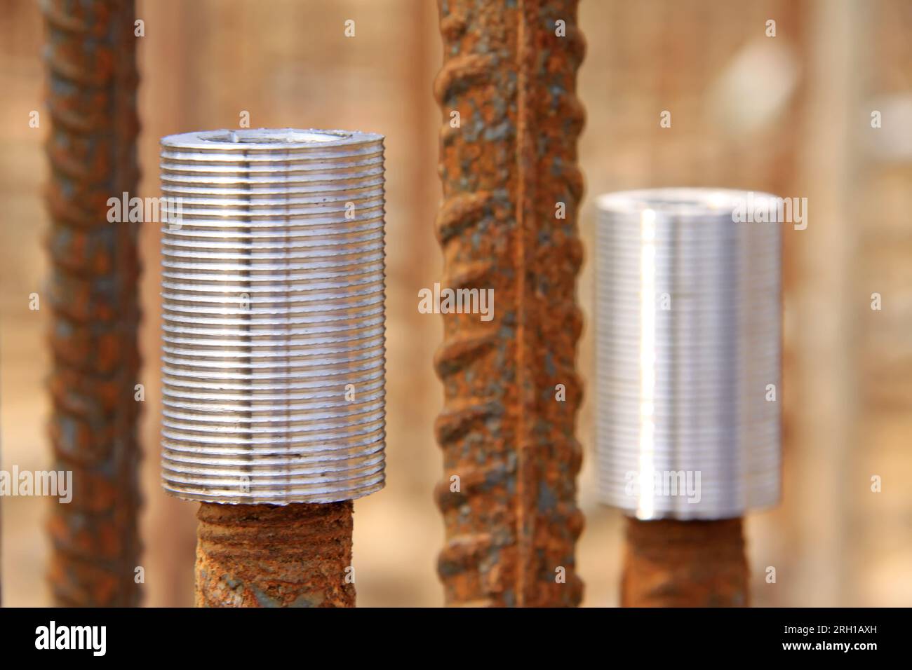 One Long Brown Iron Rod From Rebar In Rust On A Blue Background