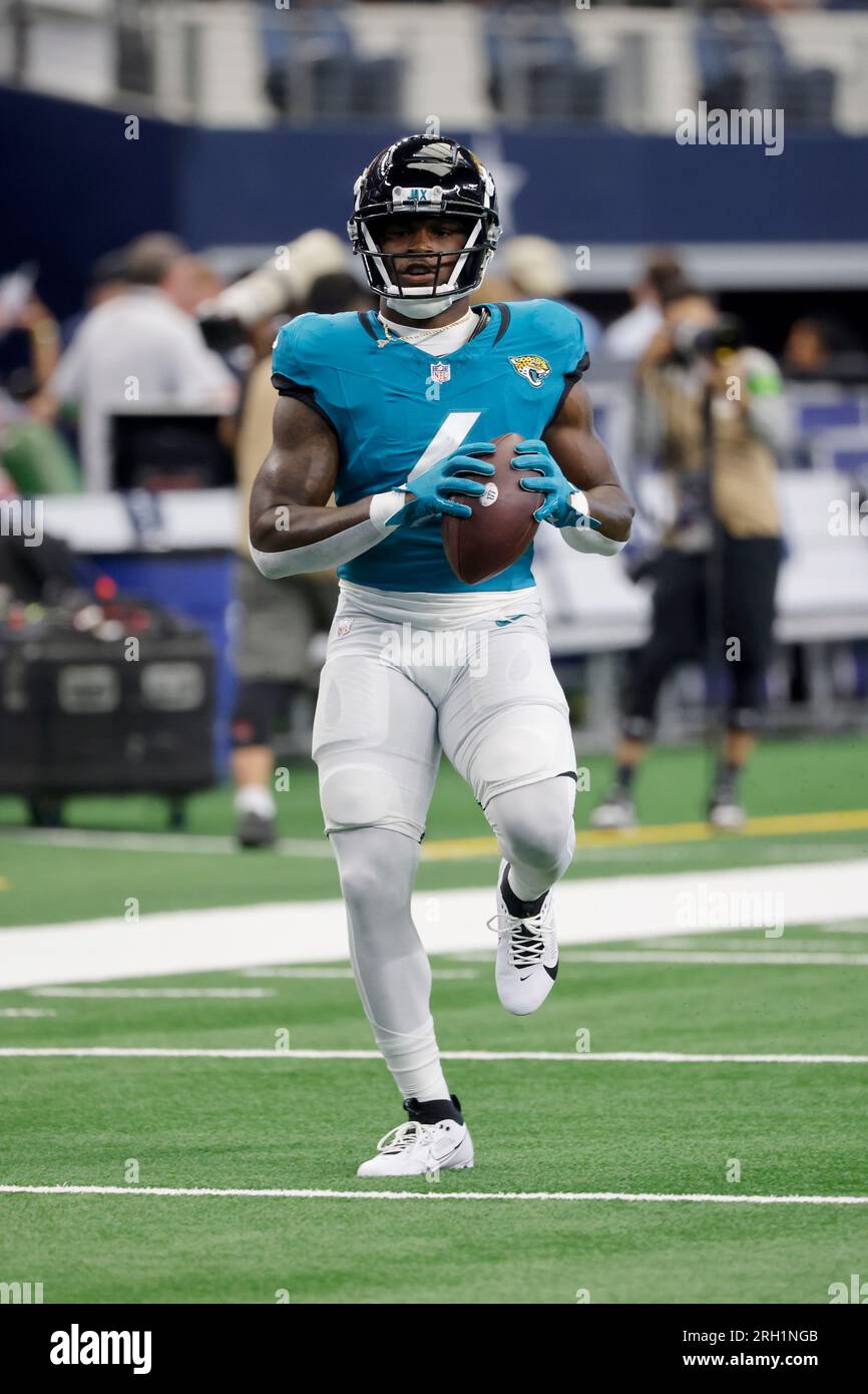 Jacksonville Jaguars running back Tank Bigsby runs with the ball prior to  an NFL Football game in Arlington, Texas, Saturday, August 12, 2023. (AP  Photo/Michael Ainsworth Stock Photo - Alamy