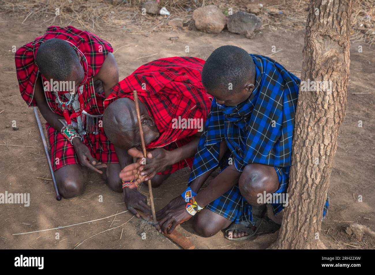 Firestarter, Masai tribe village, Amboseli National Park, Kenya, Africa Stock Photo