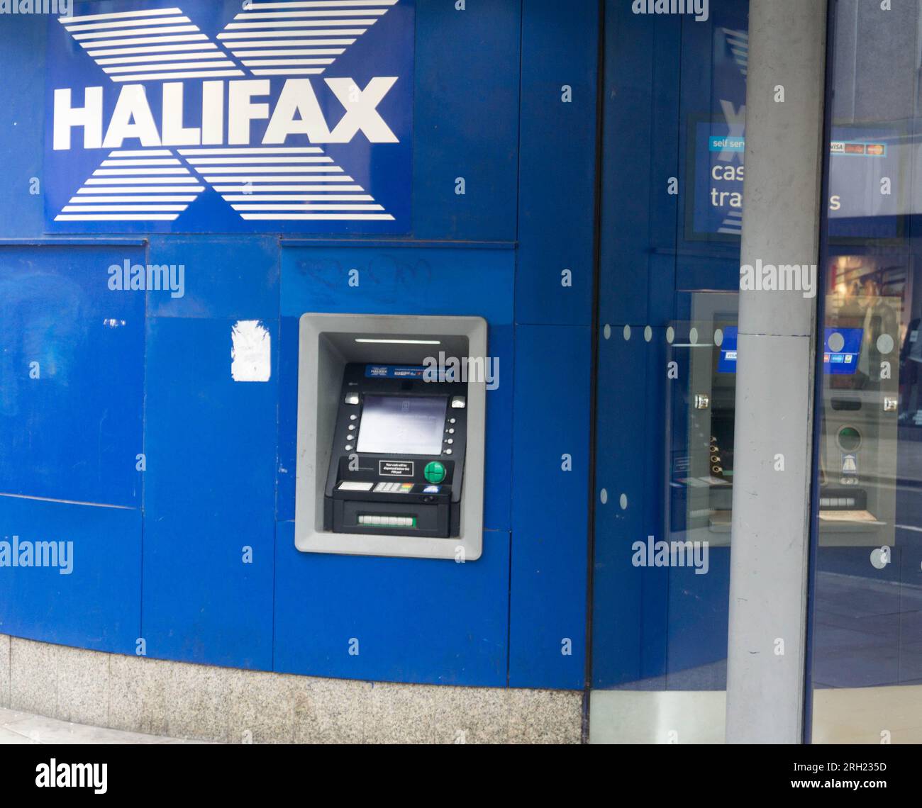 Cash dispenser at the Halifax branch in Hammersmith, London, UK Stock Photo