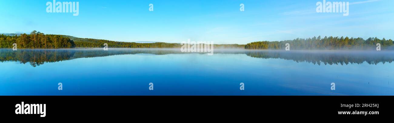 Tranquil lake sunset reflects hi-res stock photography and images - Alamy